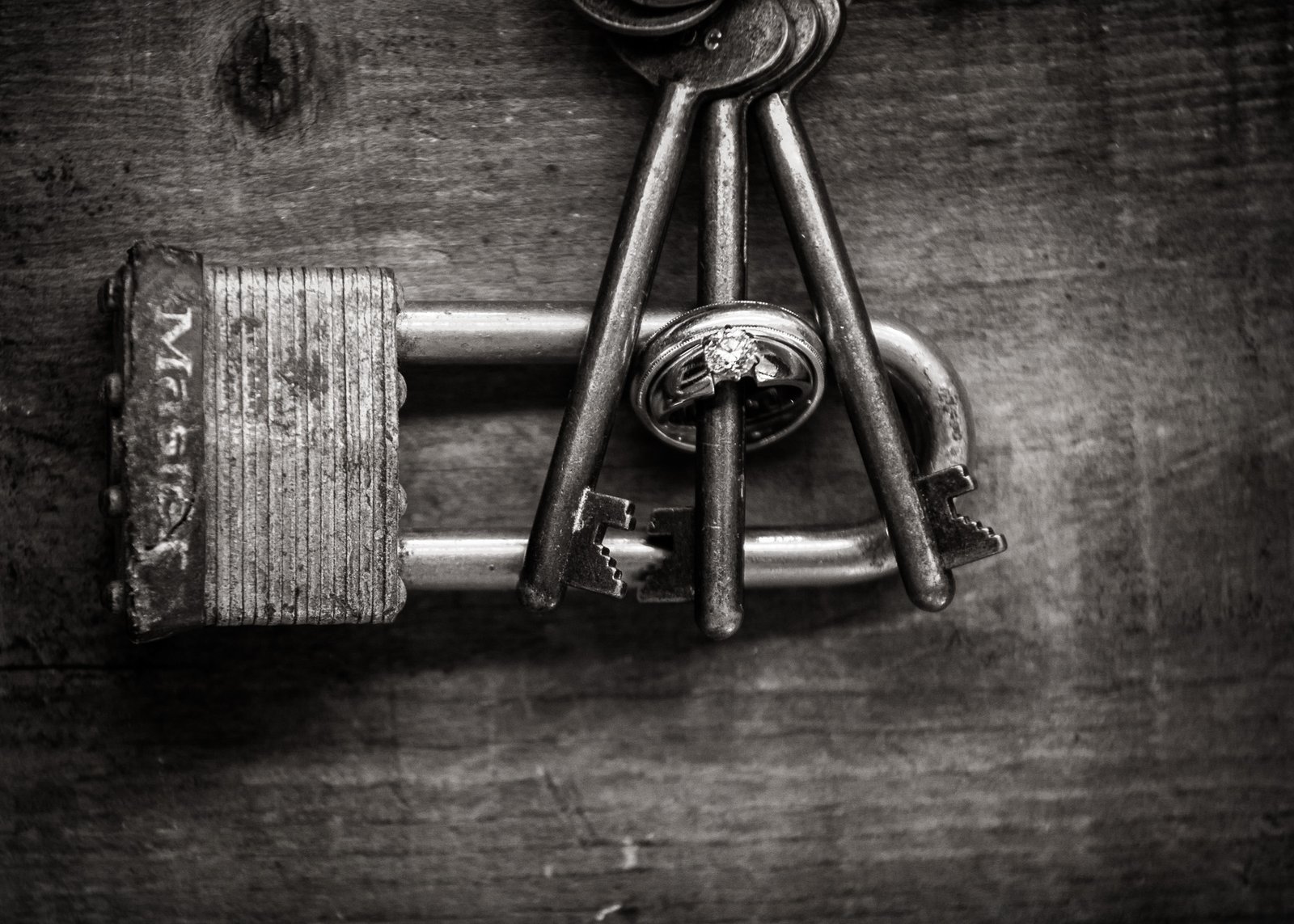 Lock key and wedding rings